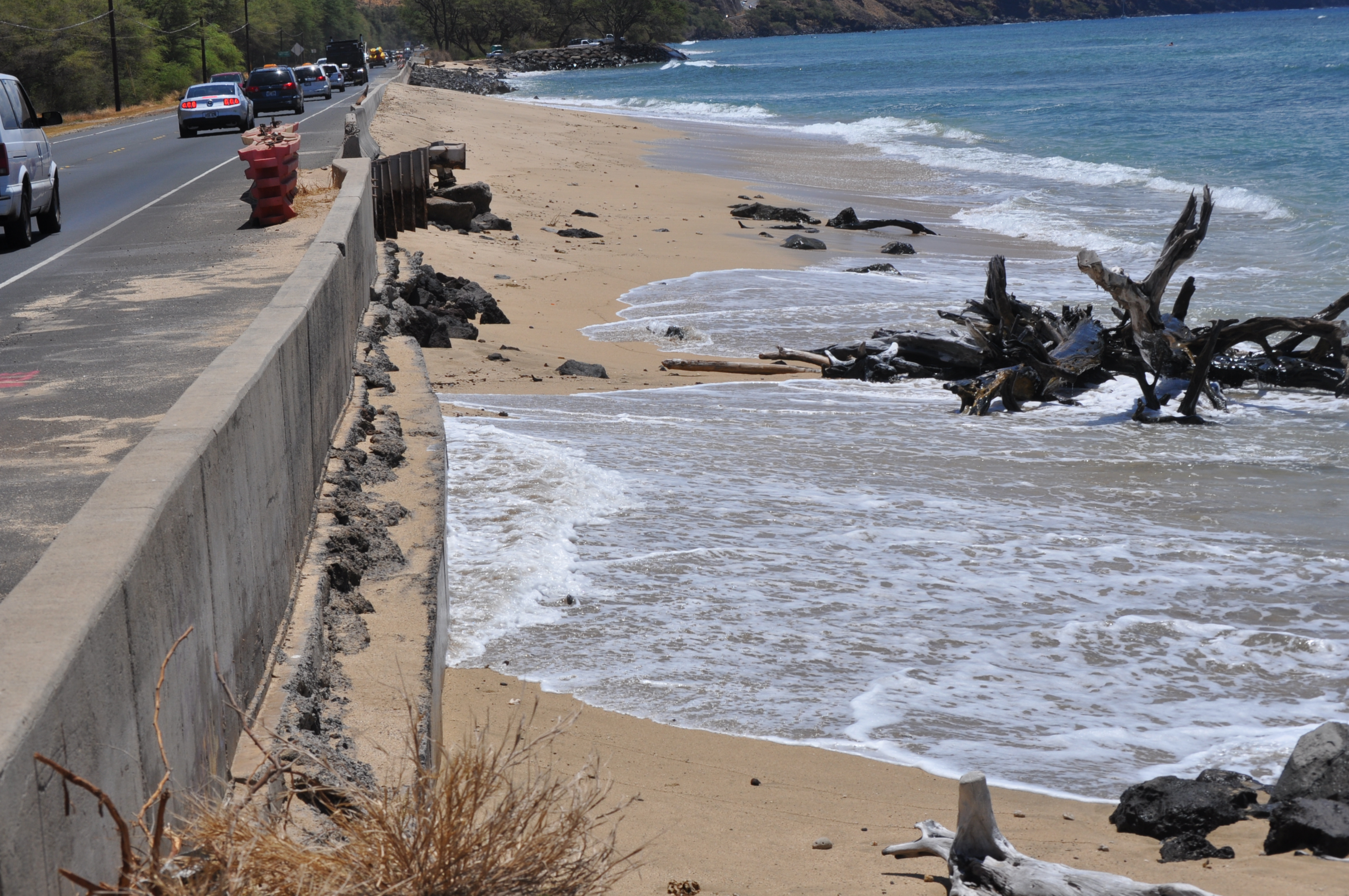 Picture of roadway with ocean and beach on the left